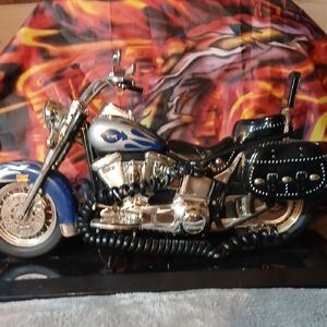 Blue and Silver Motorcycle Telephone